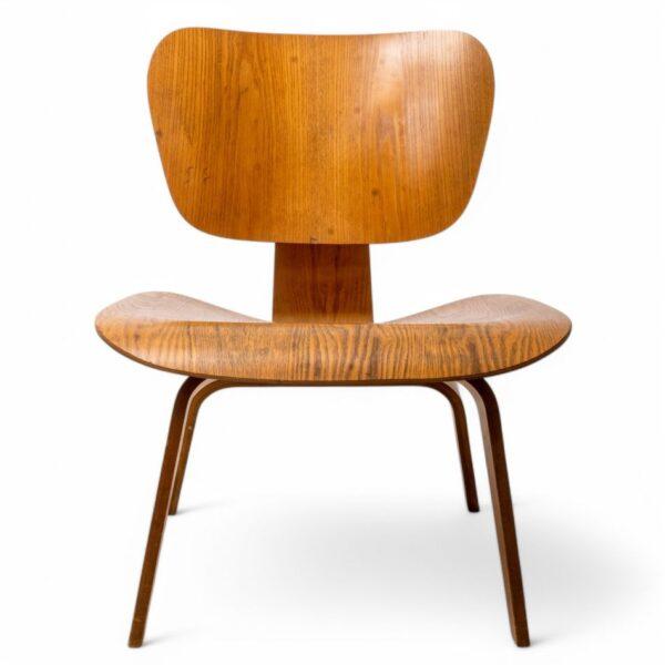 Charles And Ray Eames (American) for Herman Miller Molded Plywood DCW Chair, Ca. Mid 20th C. H 26.8" W 22.8" Depth 22.5"
