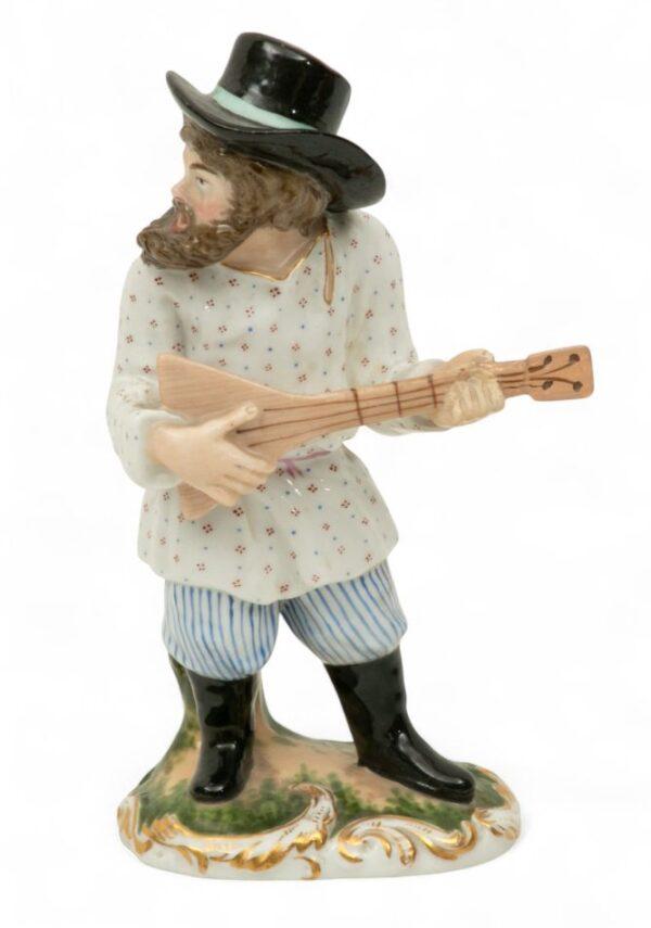 Kornilov Brothers (Russian) Porcelain Figure 'Musician', H 6.75" W 2.25" L 3.75"