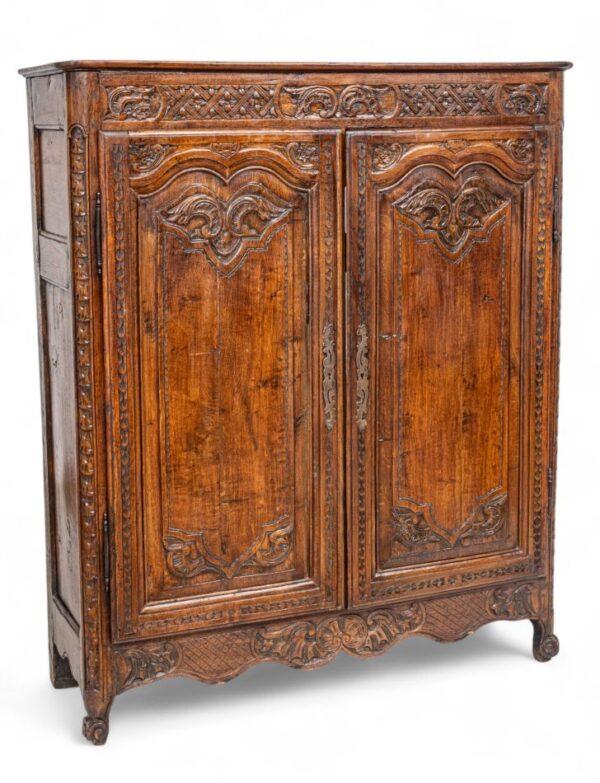 Country French Carved Walnut Diminutive Armoire, 19th Cent., H 62.5" W 52.5" Depth 17.5"